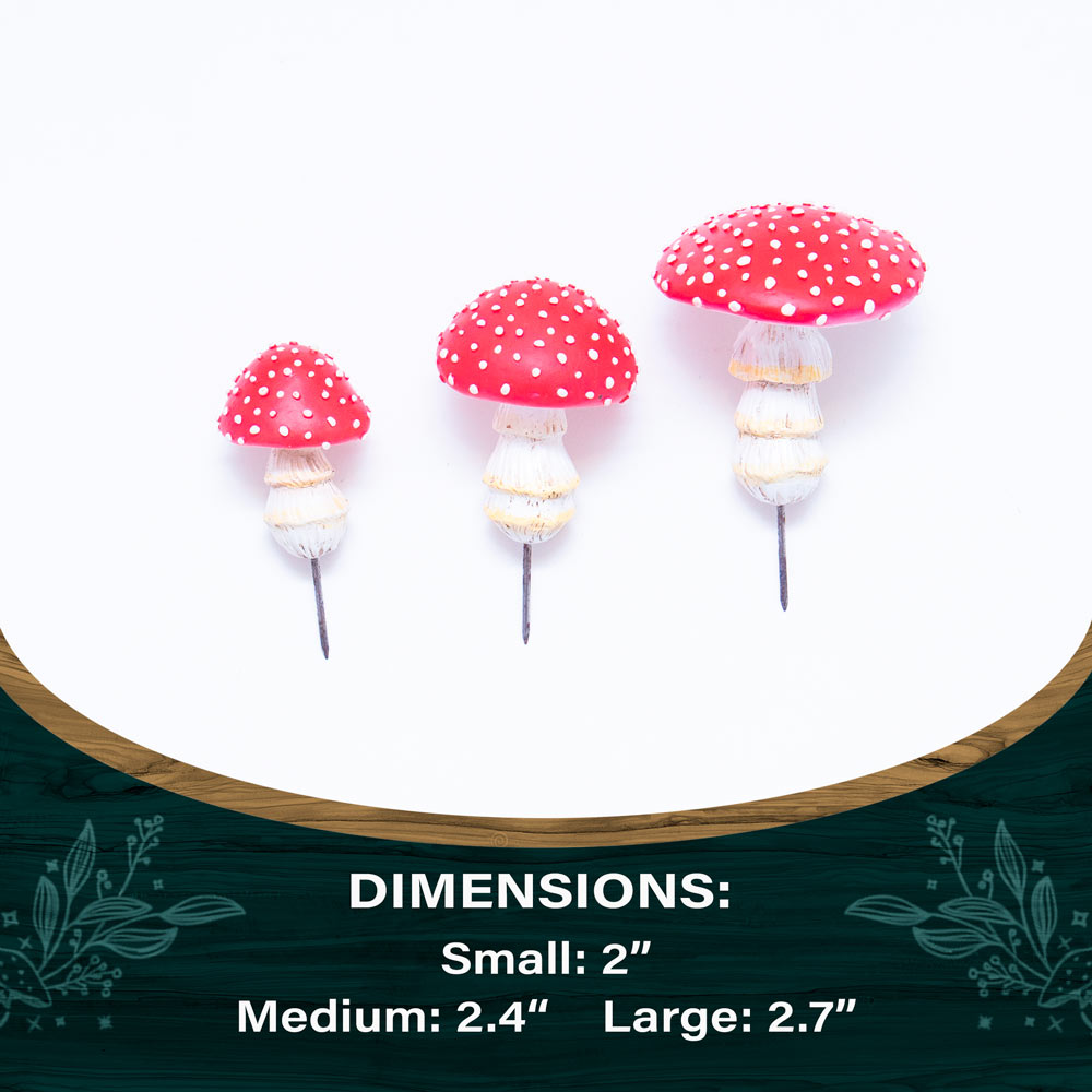 Hand-painted glow in the dark garden mushroom from Enchanted Fairy Garden Starter Kit in daylight garden setting