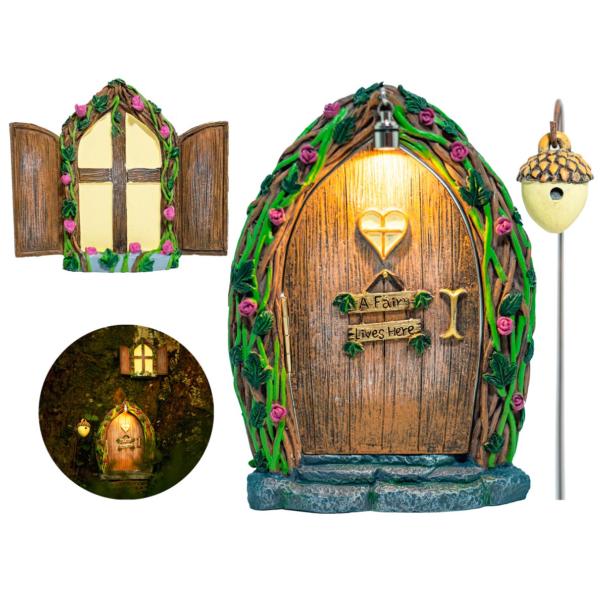 Fairy door and window set placed at the base of a garden tree surrounded by moss and green plants