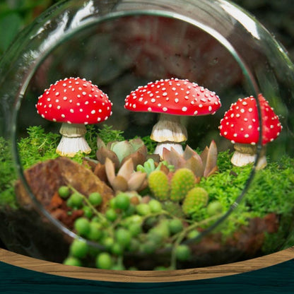 Glow in the dark mushroom figurines photographed at night showing soft green-white glow effect without batteries