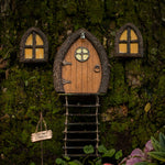 Full product flat-lay of fairy door and window set with Secret Garden sign on a neutral studio background