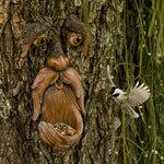 Tree Poetry tree face bird feeder front view showing expressive old man face design with built-in seed tray under the chin